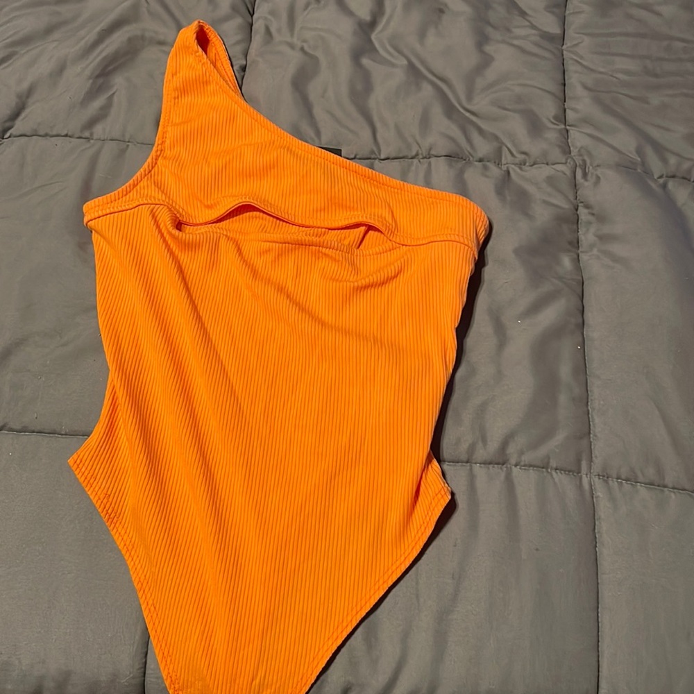 Orange body suit
